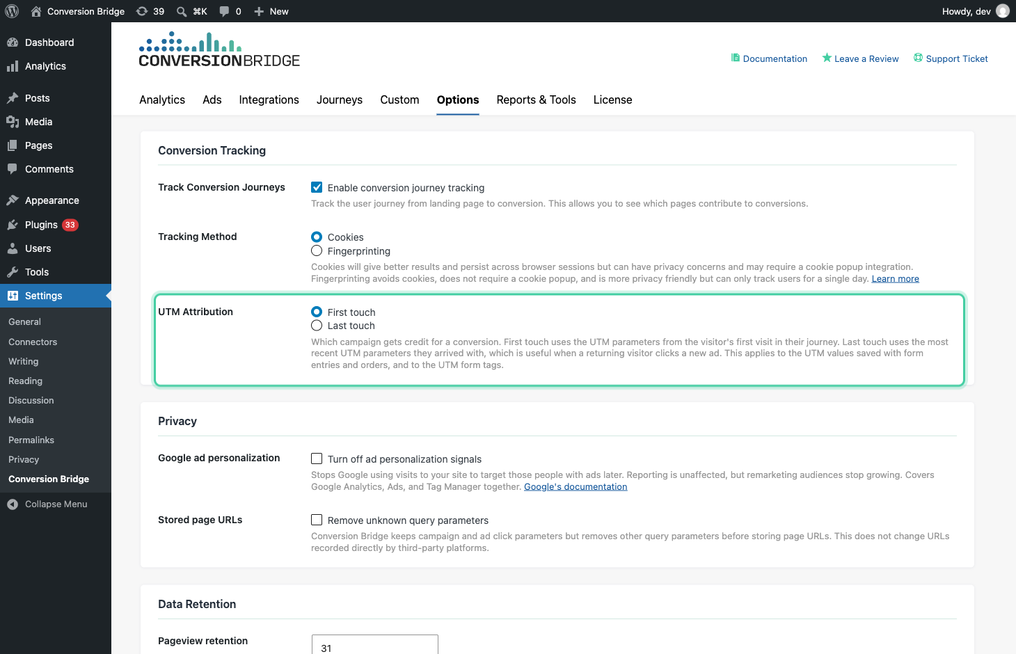Conversion Bridge UTM Attribution setting highlighted, with First touch and Last touch options